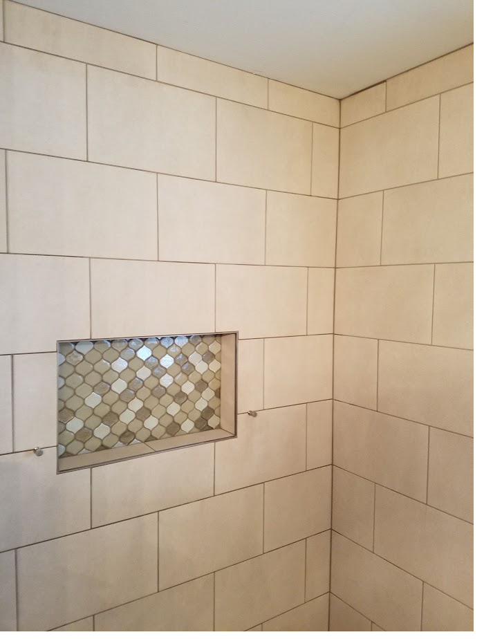 Tile detail with a mosaic accent niche